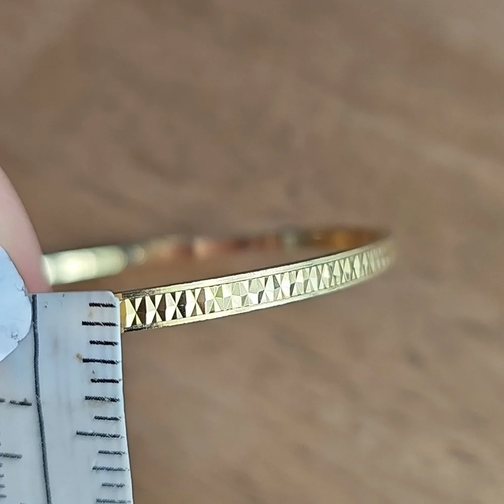 Trifari Elegant Gold Tone Bangle Bracelet